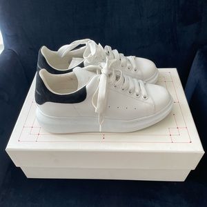Classic Alexander McQueen sneaker. White with black suede back.